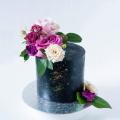 Order black celebration cake with flowers in London